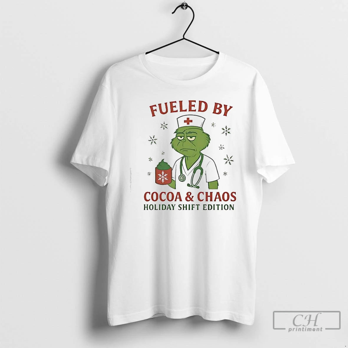 Classic Grinch Green Fueled By Cocoa Chaos Holiday Shift Edition Nurse T-Shirts, Hoodie, Sweatshirt | AU18TeeNovaLab.com