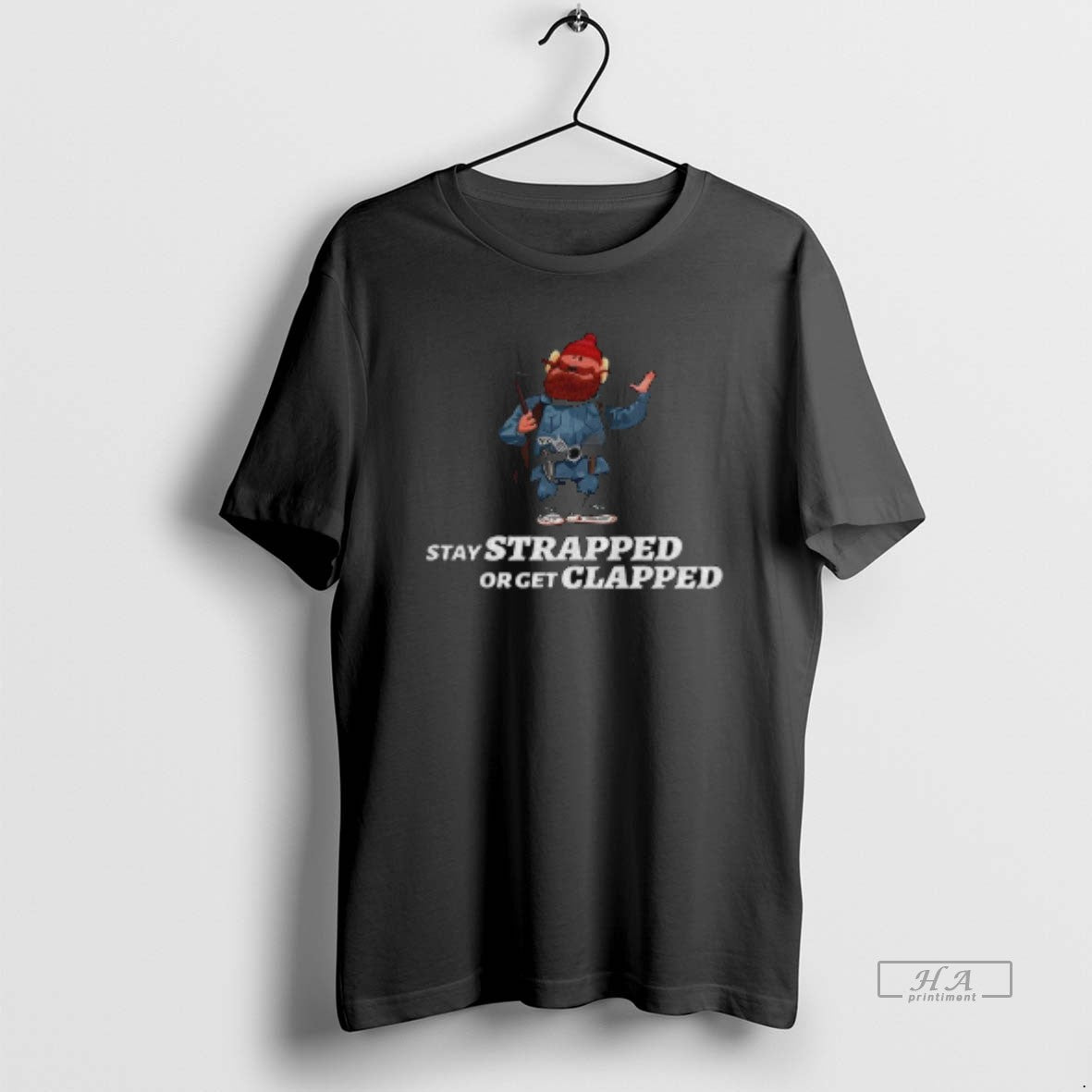 Official Yukon Cornelius Stay Strapped Or Get Clapped T-Shirts, Hoodie, Sweatshirt | AU18TeeNovaLab.com