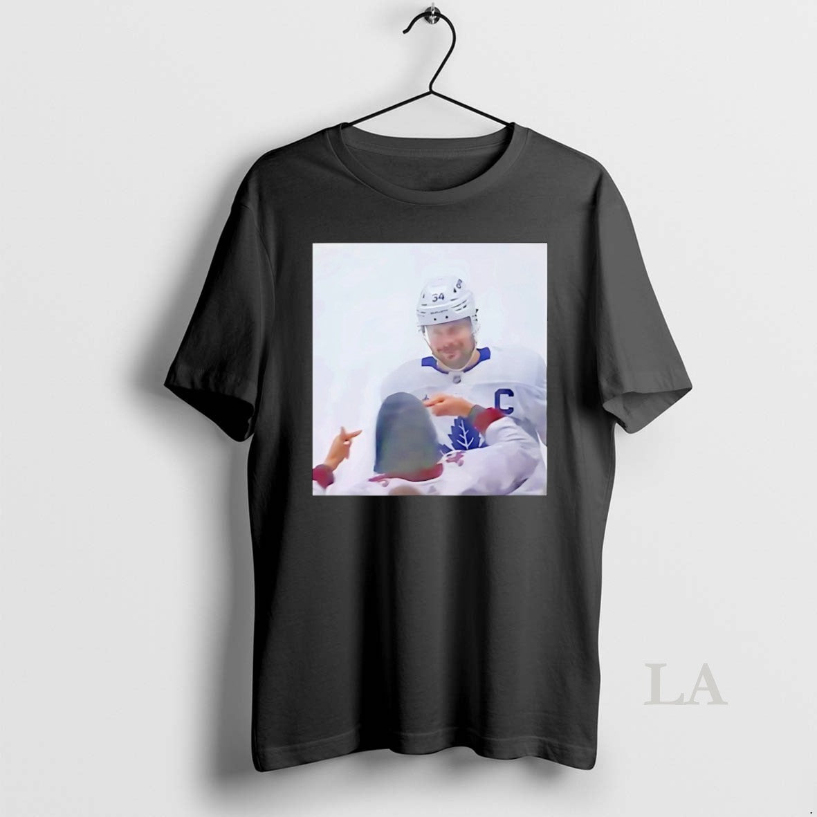 Original Auston Matthews Smirks At The Avs Fans T-Shirts, Hoodie, Sweatshirt | AU18TeeNovaLab.com